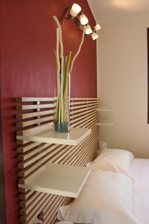 Łóżko lub łóżka w pokoju w obiekcie Agriturismo Deviscio
