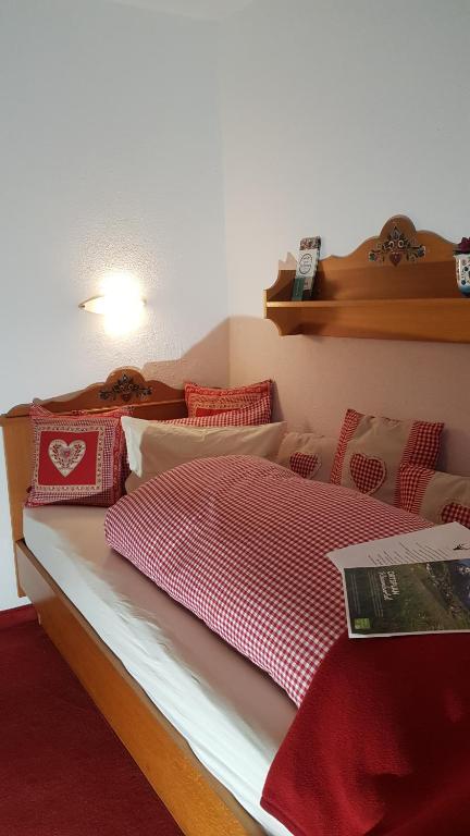 Postel nebo postele na pokoji v ubytování Haus Guentli