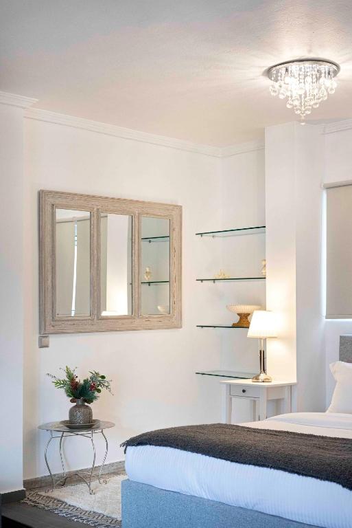 A bed or beds in a room at Mirabella spacious studio