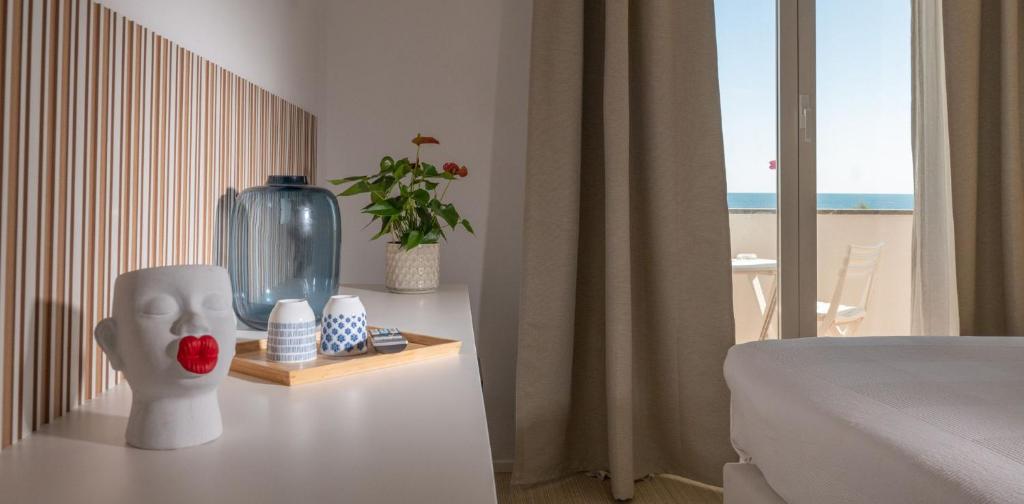 Postel nebo postele na pokoji v ubytování Mia Hotel Numana
