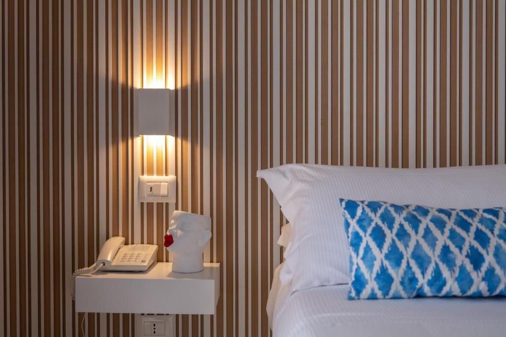Postel nebo postele na pokoji v ubytování Mia Hotel Numana