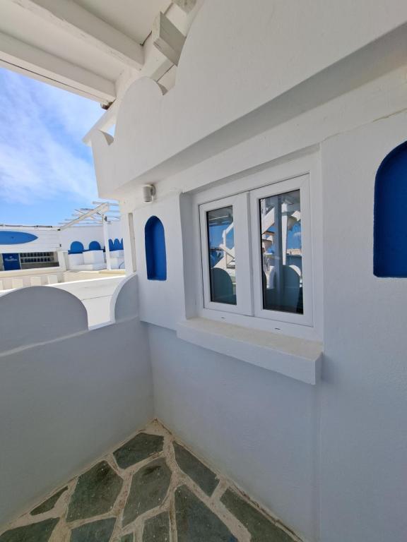 Rõdu või terrass majutusasutuses Naval Hotel Aegina