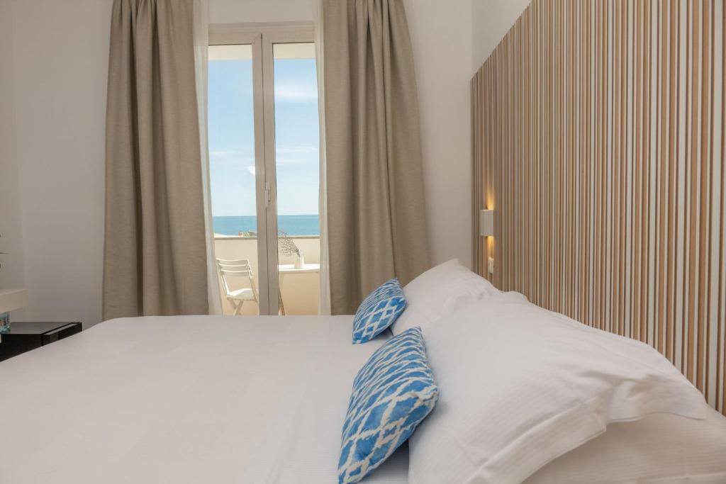 Postel nebo postele na pokoji v ubytování Mia Hotel Numana
