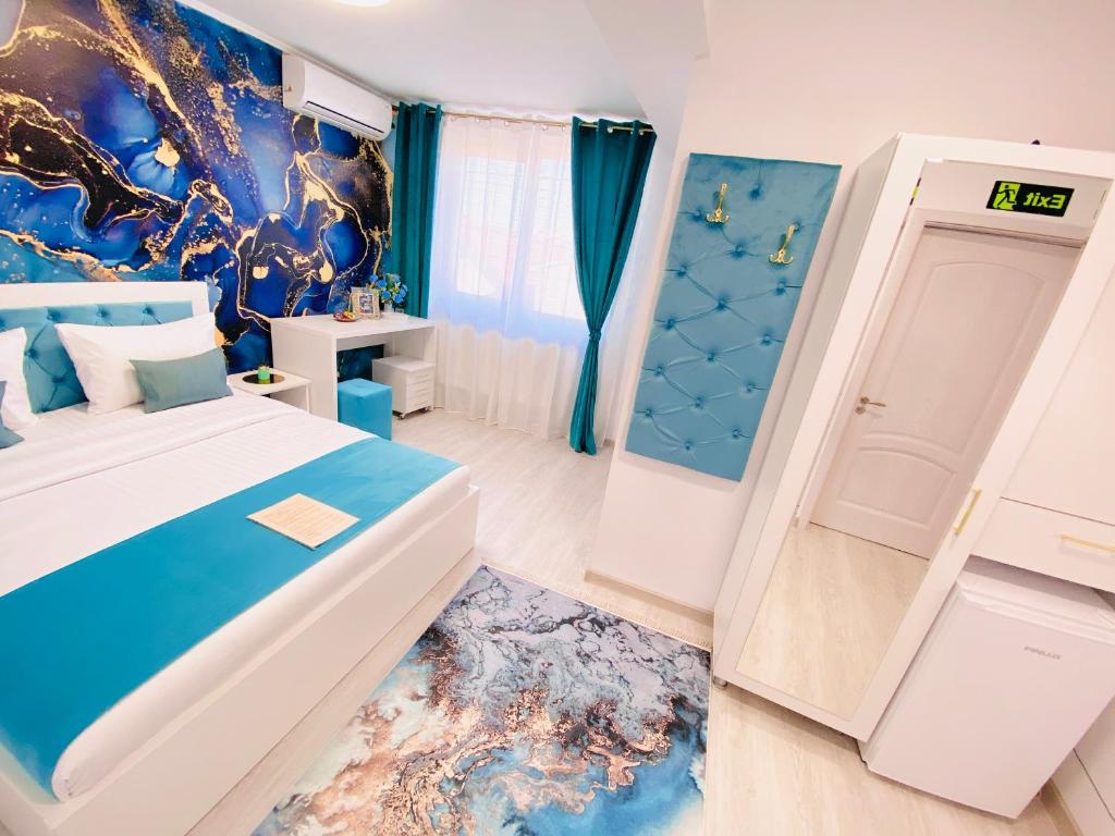 Postel nebo postele na pokoji v ubytování IANIS Rooms