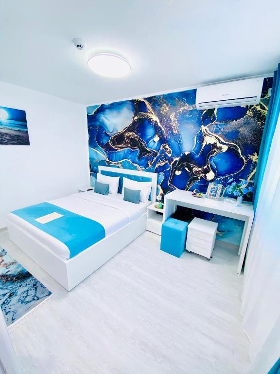 Postel nebo postele na pokoji v ubytování IANIS Rooms