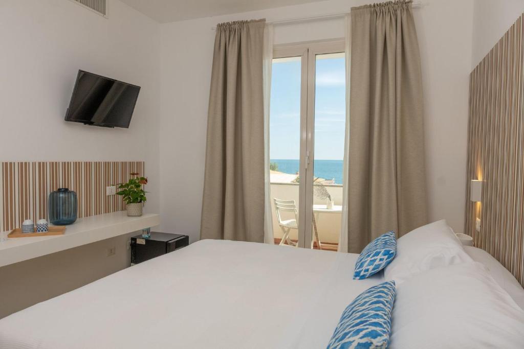 Postel nebo postele na pokoji v ubytování Mia Hotel Numana
