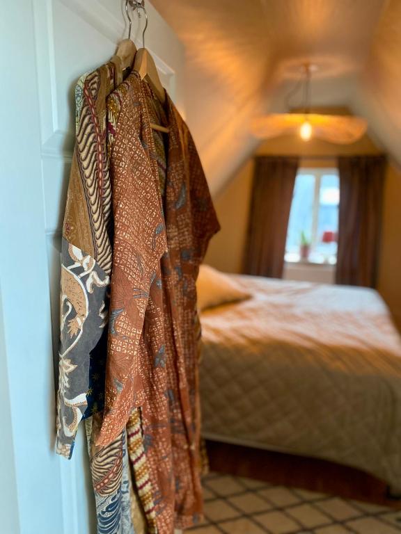 Postel nebo postele na pokoji v ubytování Lomma Station Inn Loft