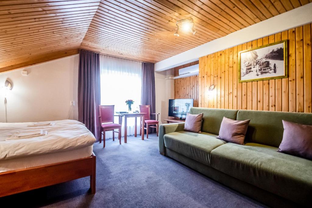 Postel nebo postele na pokoji v ubytování Hotel Squash Centrum