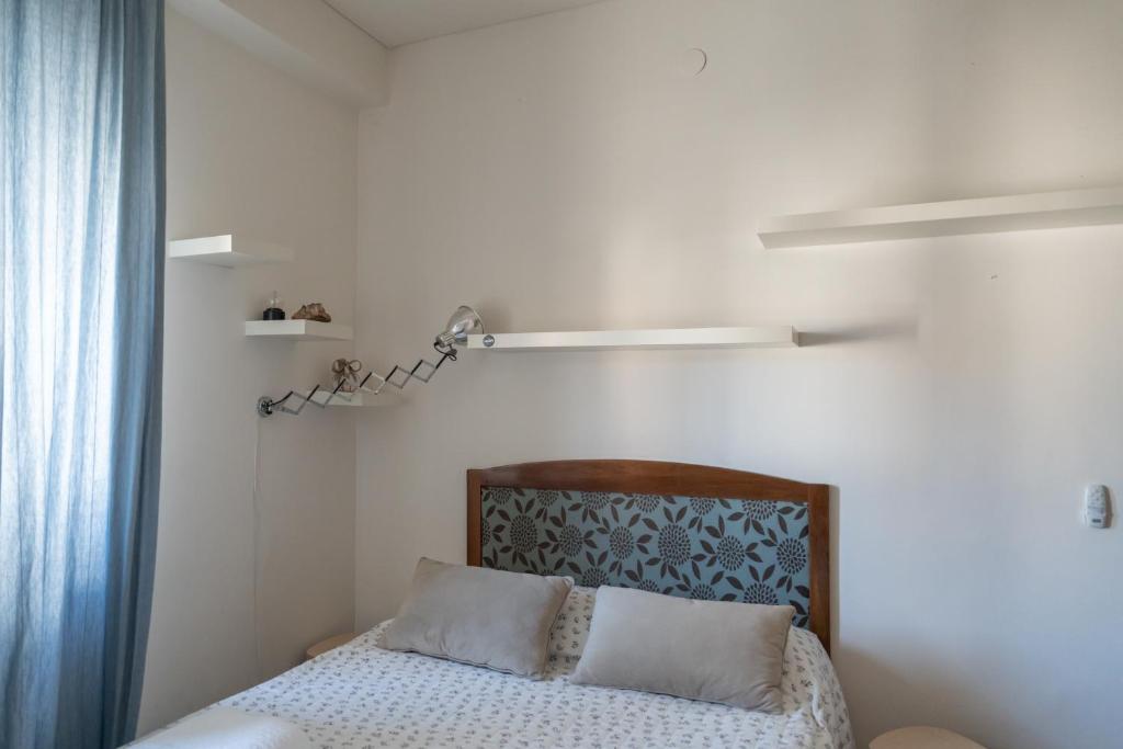 A bed or beds in a room at Casa dei Ruscelli
