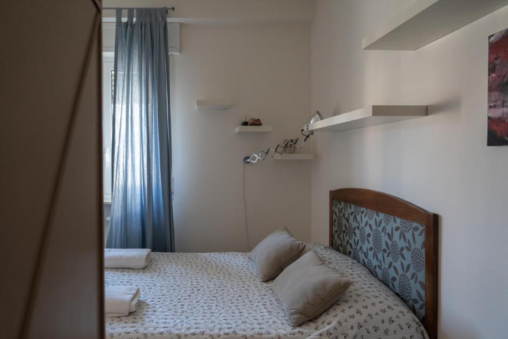 A bed or beds in a room at Casa dei Ruscelli