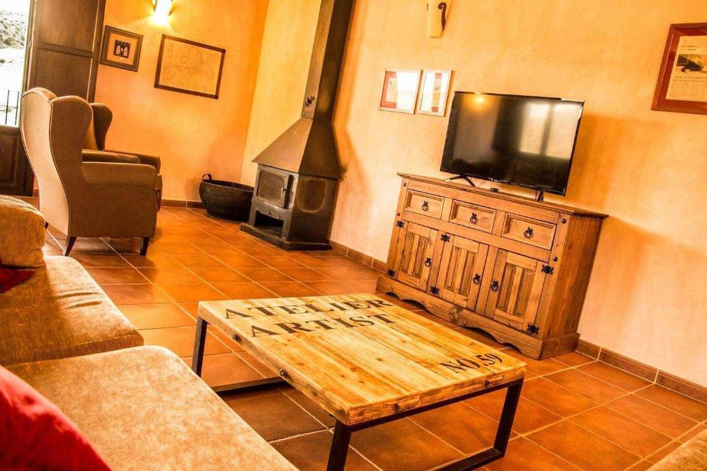 TV a/nebo společenská místnost v ubytování La Casa de la Quesería