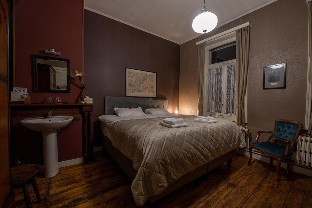 Łóżko lub łóżka w pokoju w obiekcie Talbot House