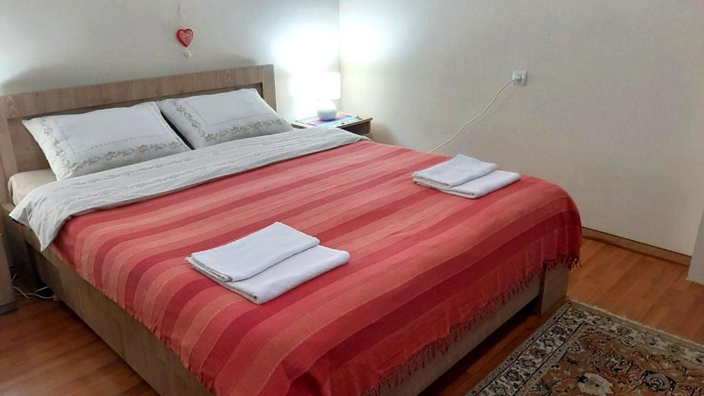 מיטה או מיטות בחדר ב-Beso-house