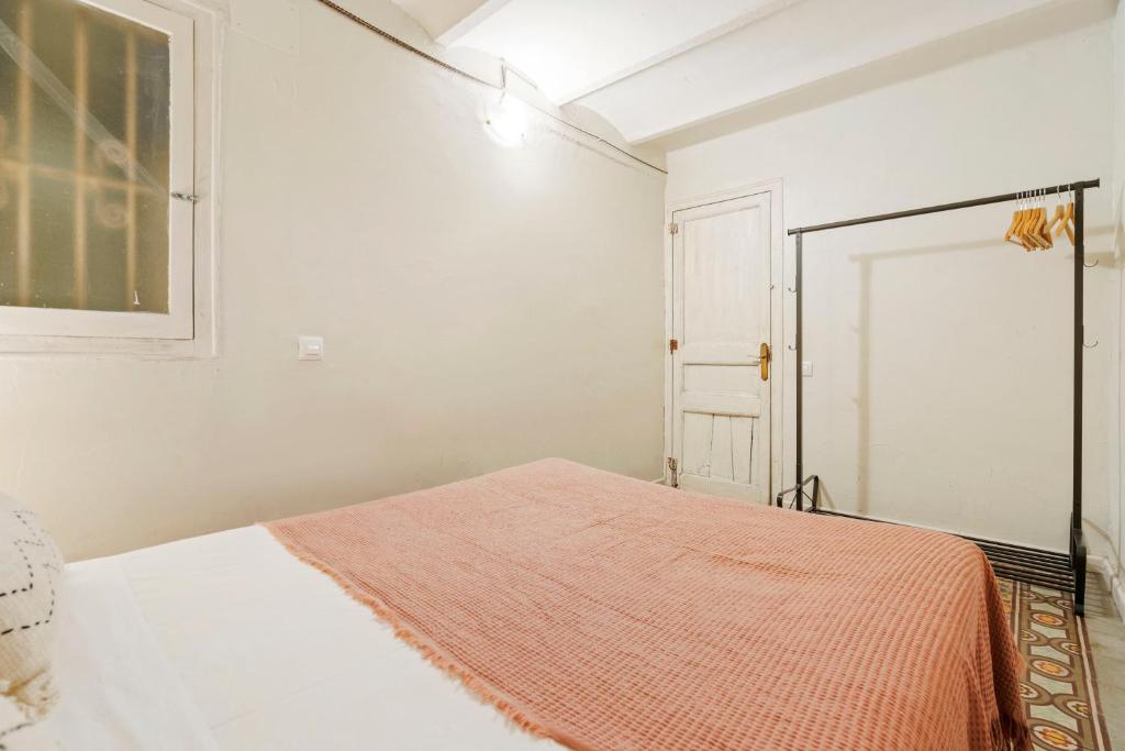 Posteľ alebo postele v izbe v ubytovaní Flateli Poble Sec