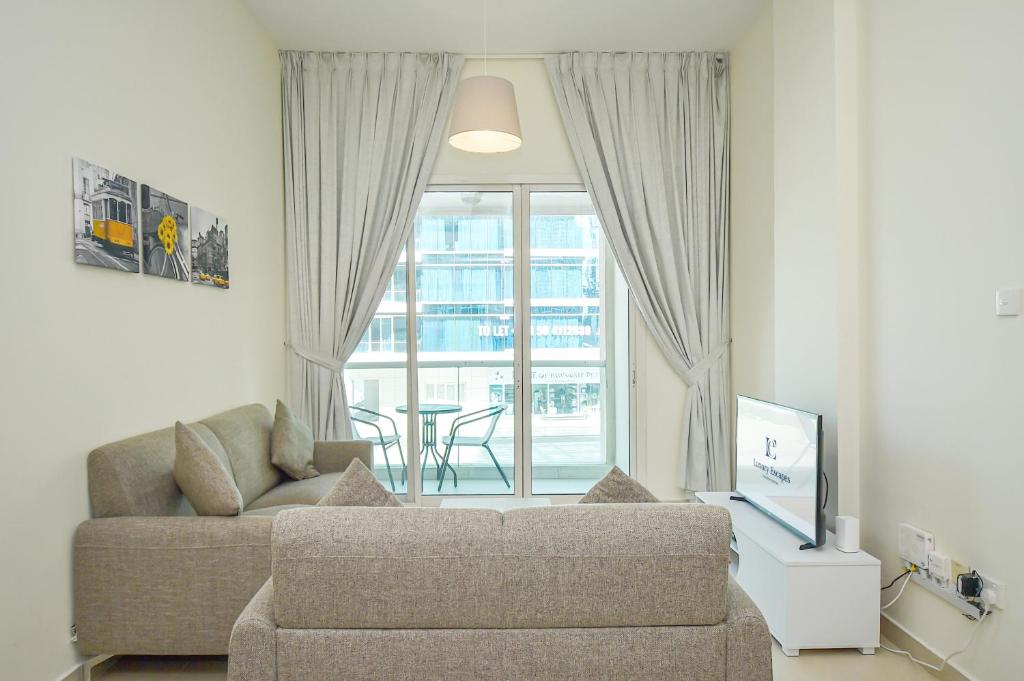 Posezení v ubytování Cozy 1 Bedroom with Study room in Dubai Marina - Ideal for 3 Guests - PRK