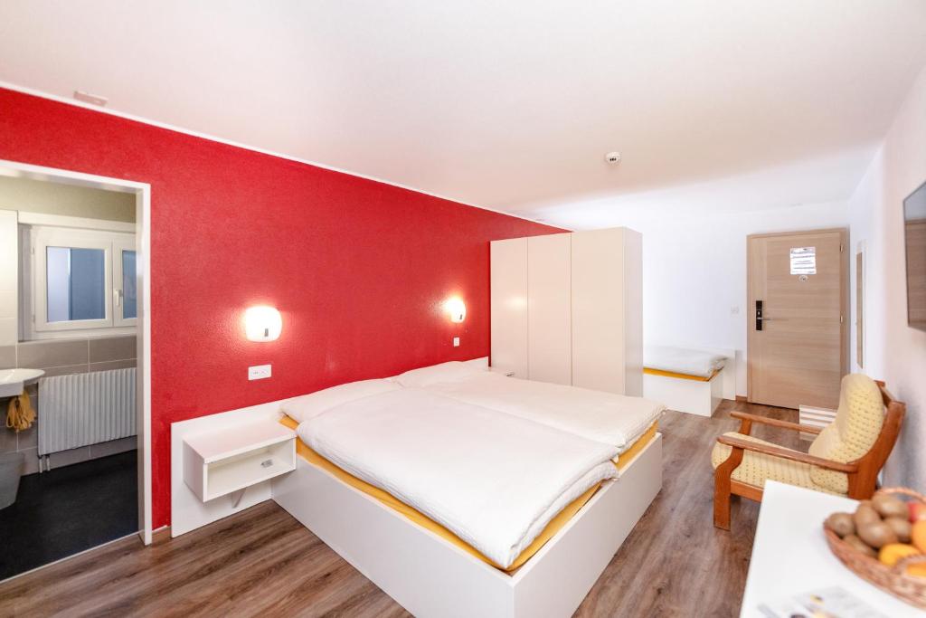Voodi või voodid majutusasutuse Hotel Mountime toas