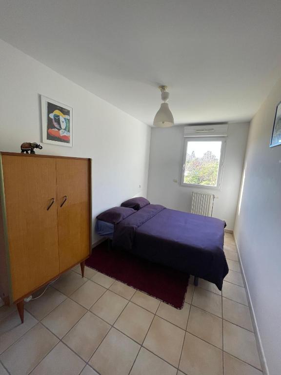 Posteľ alebo postele v izbe v ubytovaní Le Nomade, Parc Montcalm et stationnement privé