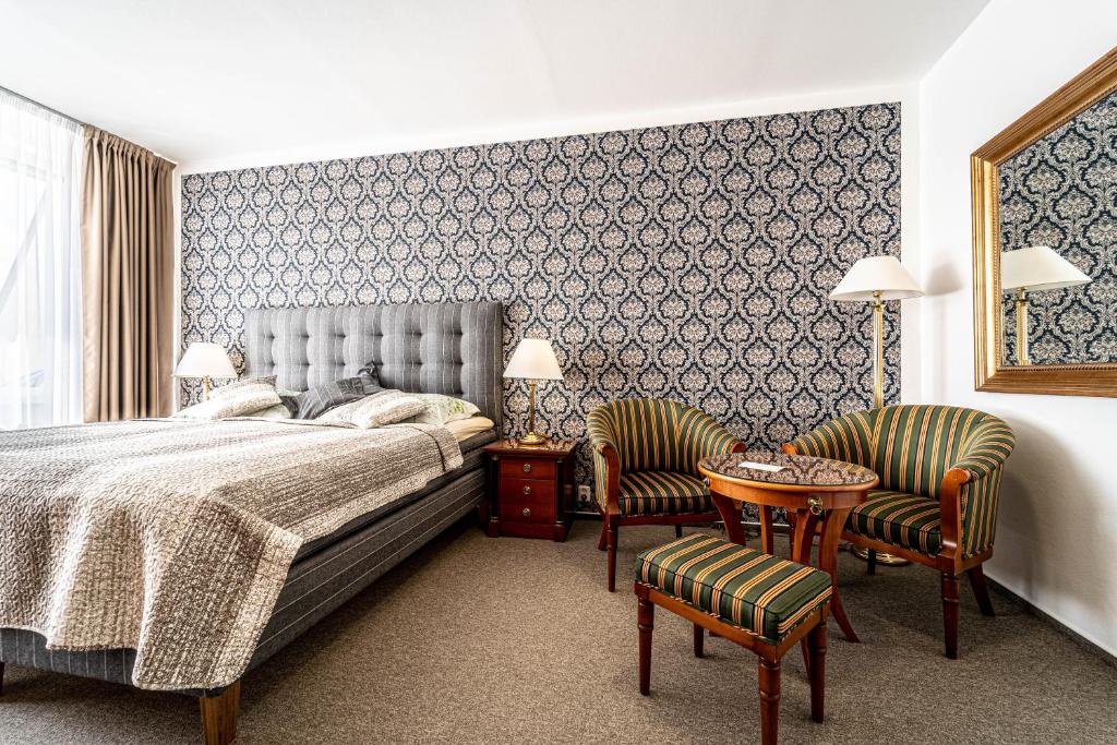 Postel nebo postele na pokoji v ubytování Hotel Fontána