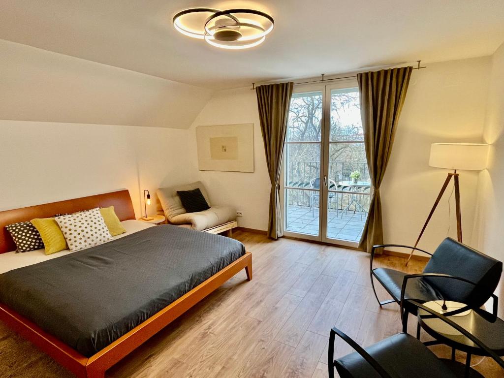 Łóżko lub łóżka w pokoju w obiekcie Apartmány Dlouhá