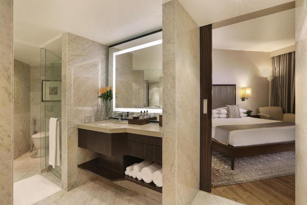 Postel nebo postele na pokoji v ubytování Hyatt Regency Delhi