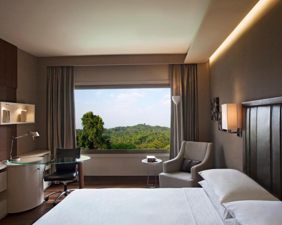 Postel nebo postele na pokoji v ubytování Hyatt Regency Delhi