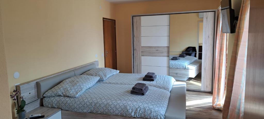 Postel nebo postele na pokoji v ubytování Ristorante Gordolese con alloggio