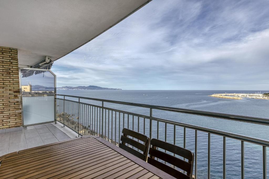 a balcony with a view of the water at Marinada in L'Escala