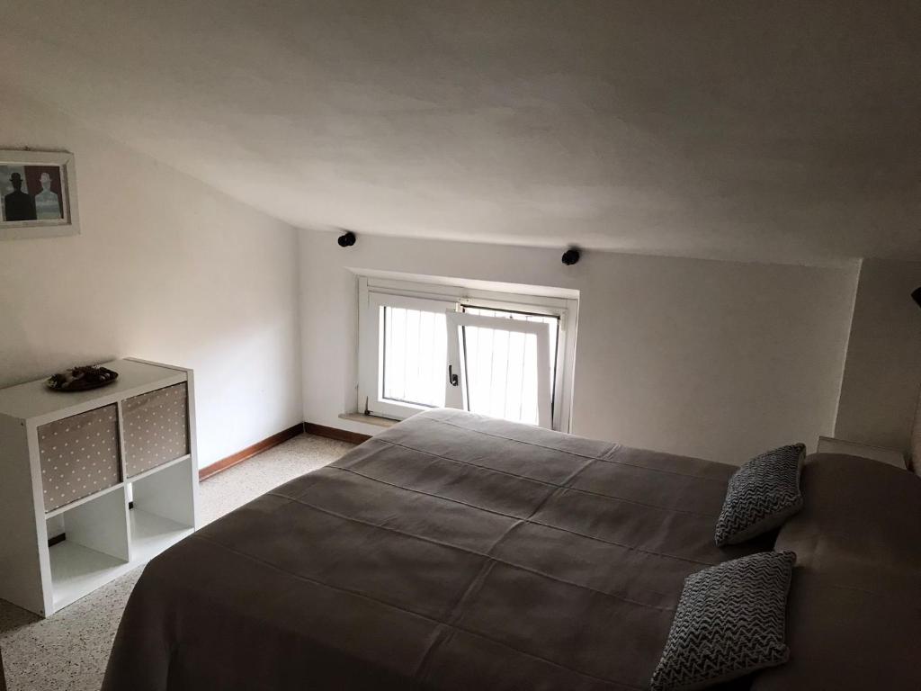 Łóżko lub łóżka w pokoju w obiekcie Hotel Perla Verde