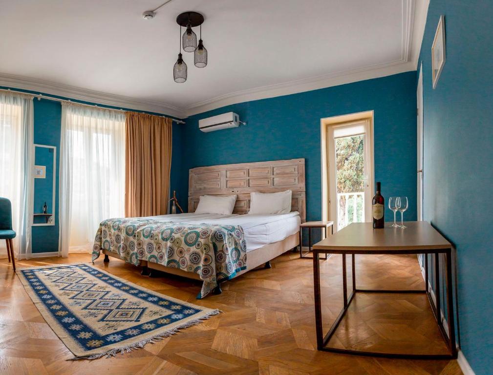 Postel nebo postele na pokoji v ubytování Gvino Minda