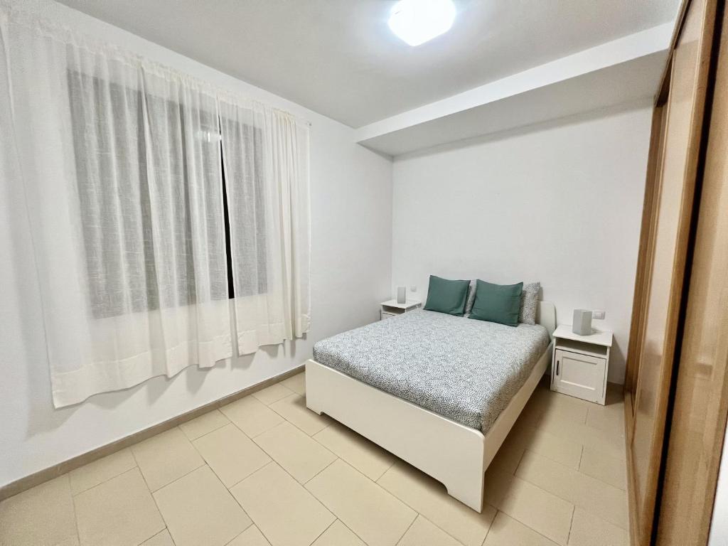 Кровать или кровати в номере Casa Azul - Piso amplio en la capital