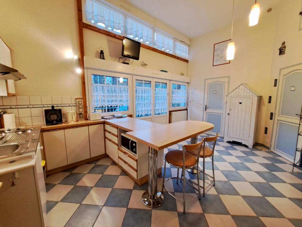 Kuchyňa alebo kuchynka v ubytovaní Petite Maison de plage