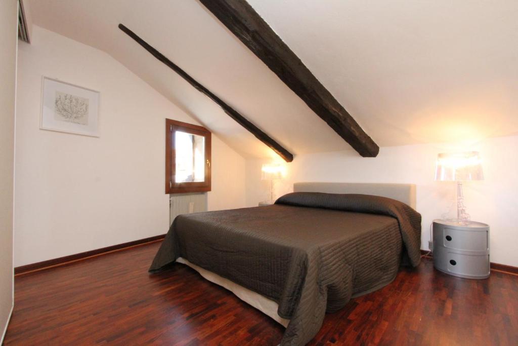 Posteľ alebo postele v izbe v ubytovaní City Apartments Rialto Market