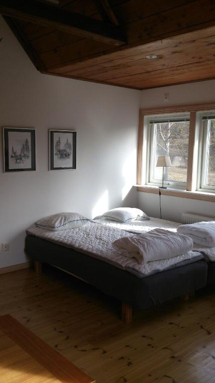 Postel nebo postele na pokoji v ubytování Loft Ålaryd