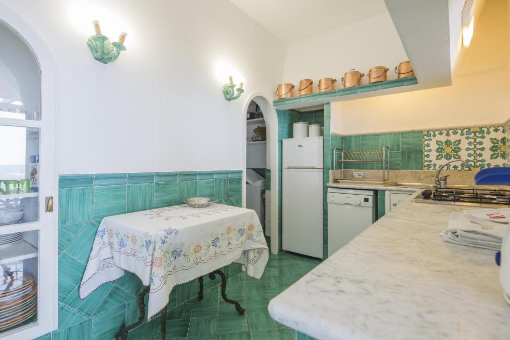 A kitchen or kitchenette at Estate4home - Villa San Montano