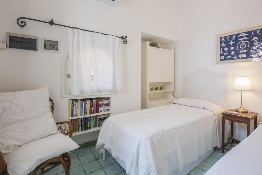 A bed or beds in a room at Estate4home - Villa San Montano
