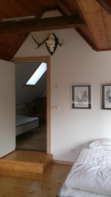 Postel nebo postele na pokoji v ubytování Loft Ålaryd