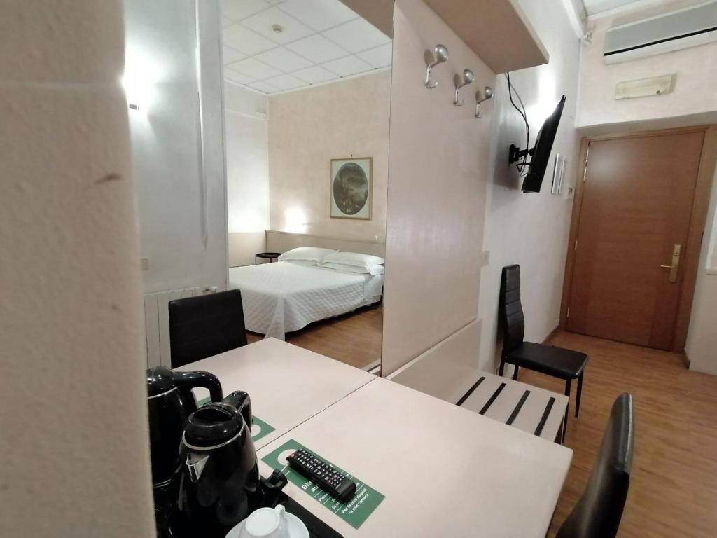 Ліжко або ліжка в номері Hotel Julia