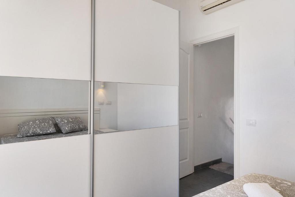 Postel nebo postele na pokoji v ubytování Moderno Triplex Sonneland