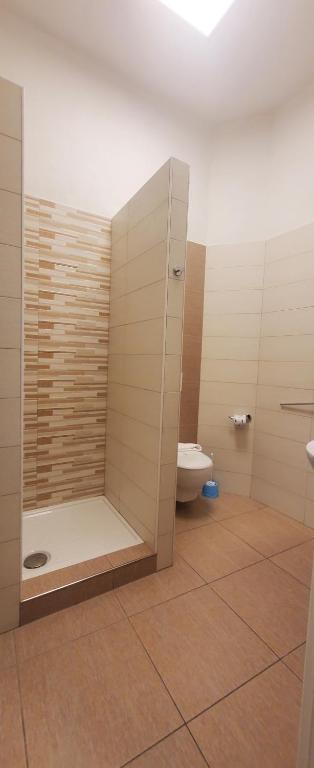 a bathroom with a shower and a toilet at Albergo Annabella in Santa Margherita Ligure