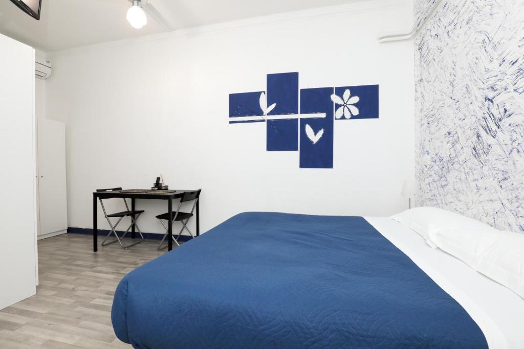 Postel nebo postele na pokoji v ubytování Le Mura room&breakfast