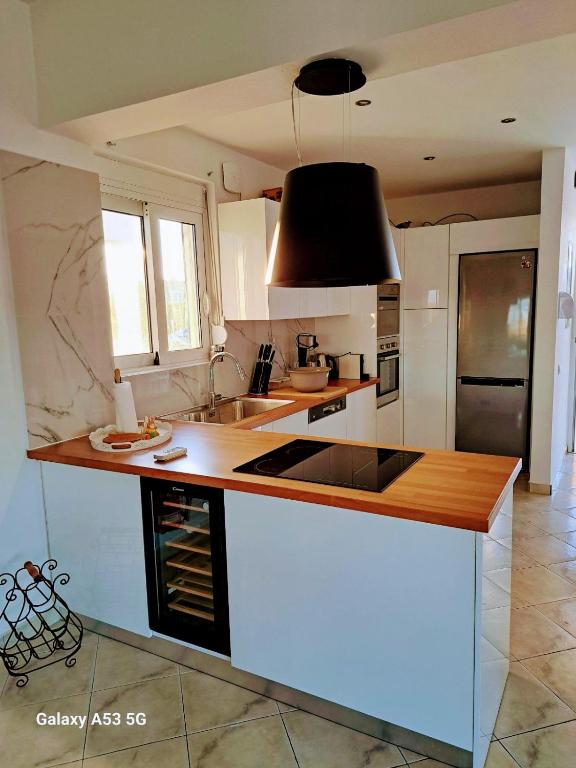 Kuchyň nebo kuchyňský kout v ubytování S-EVA RESORT