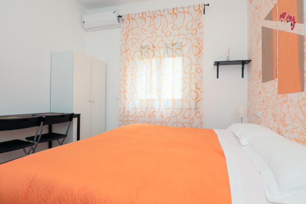 Postel nebo postele na pokoji v ubytování Le Mura room&breakfast