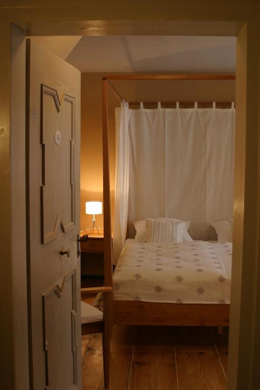 Postel nebo postele na pokoji v ubytování Hotel am Hoken