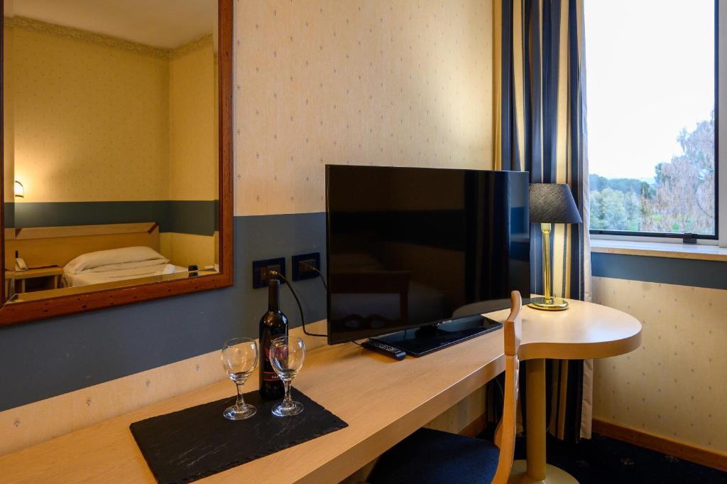 TV a/nebo společenská místnost v ubytování Hotel Torre Di Pratolungo