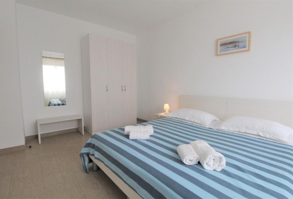 Posteľ alebo postele v izbe v ubytovaní Apartment with pool Albina 3