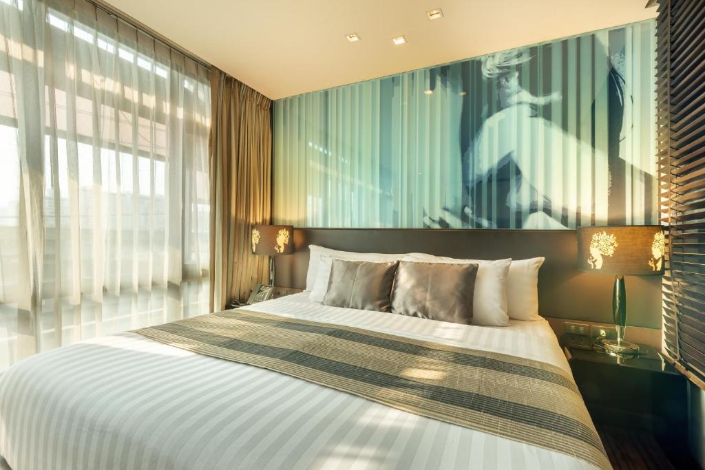 Katil atau katil-katil dalam bilik di M2 de Bangkok Hotel