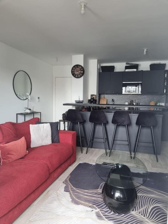 Kuchyňa alebo kuchynka v ubytovaní Appartement cosy et équipé