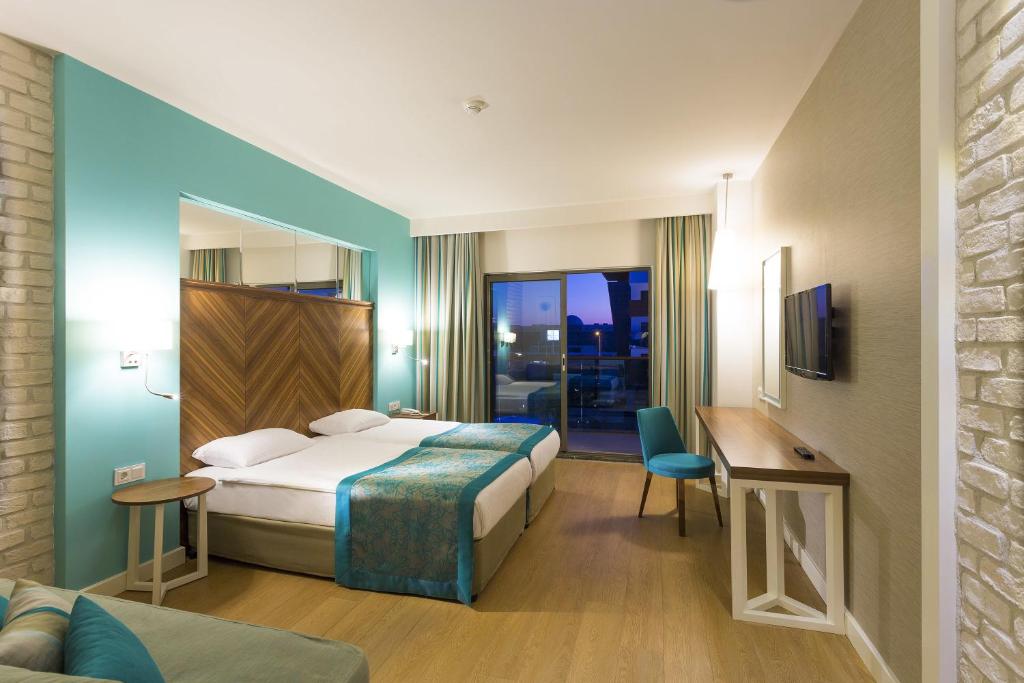 Postel nebo postele na pokoji v ubytování Terrace Elite Resort Ultra All Inclusive