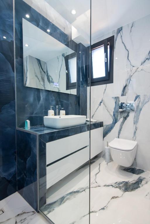 Koupelna v ubytování RAFAELA SUITES