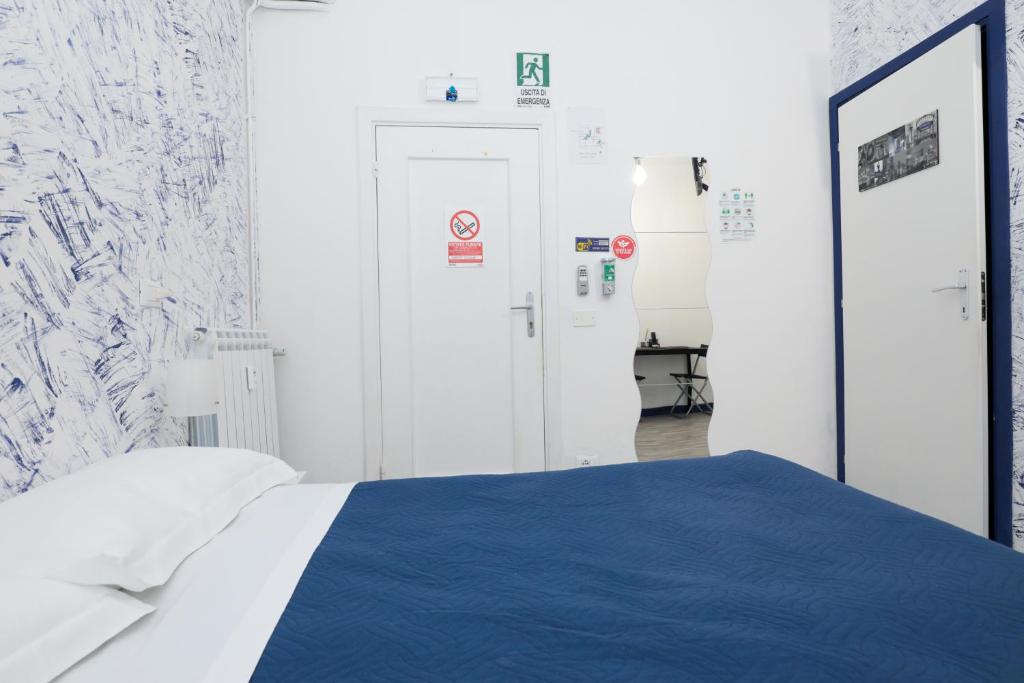 Postel nebo postele na pokoji v ubytování Le Mura room&breakfast